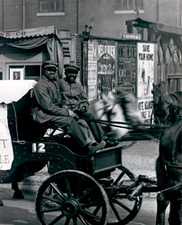 Teamsters Drive a City Ash Wagon in a Parade of Sanitation Equipment on Market Street